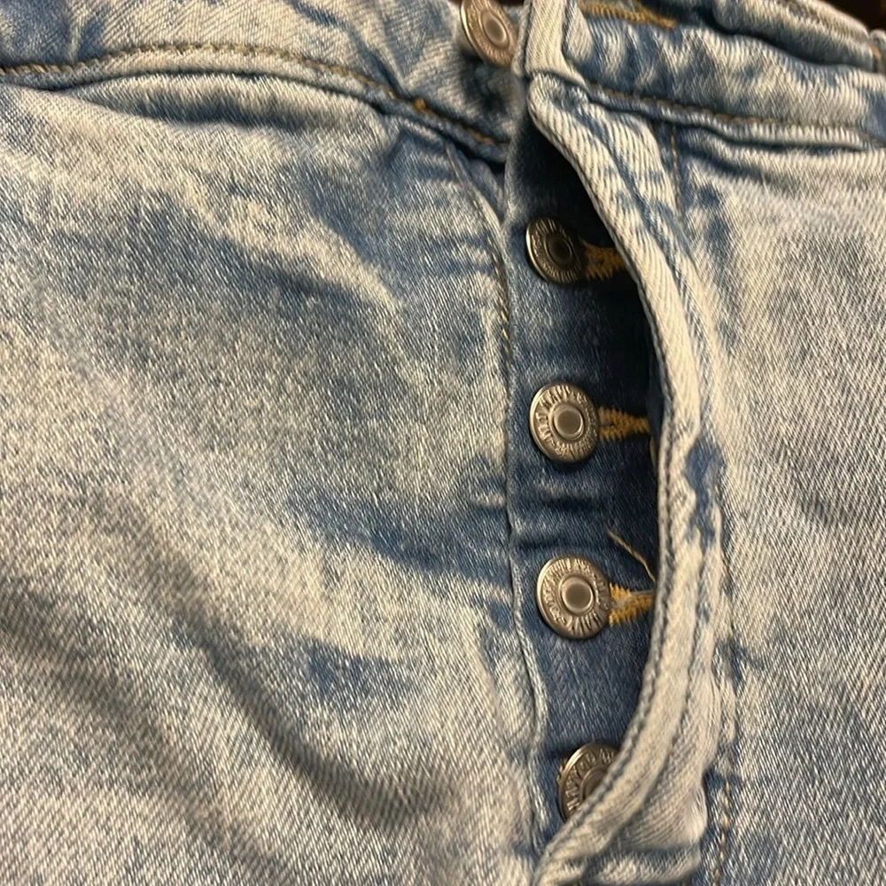 Old Navy - medium wash distressed blue jean shorts - button fly - size 18